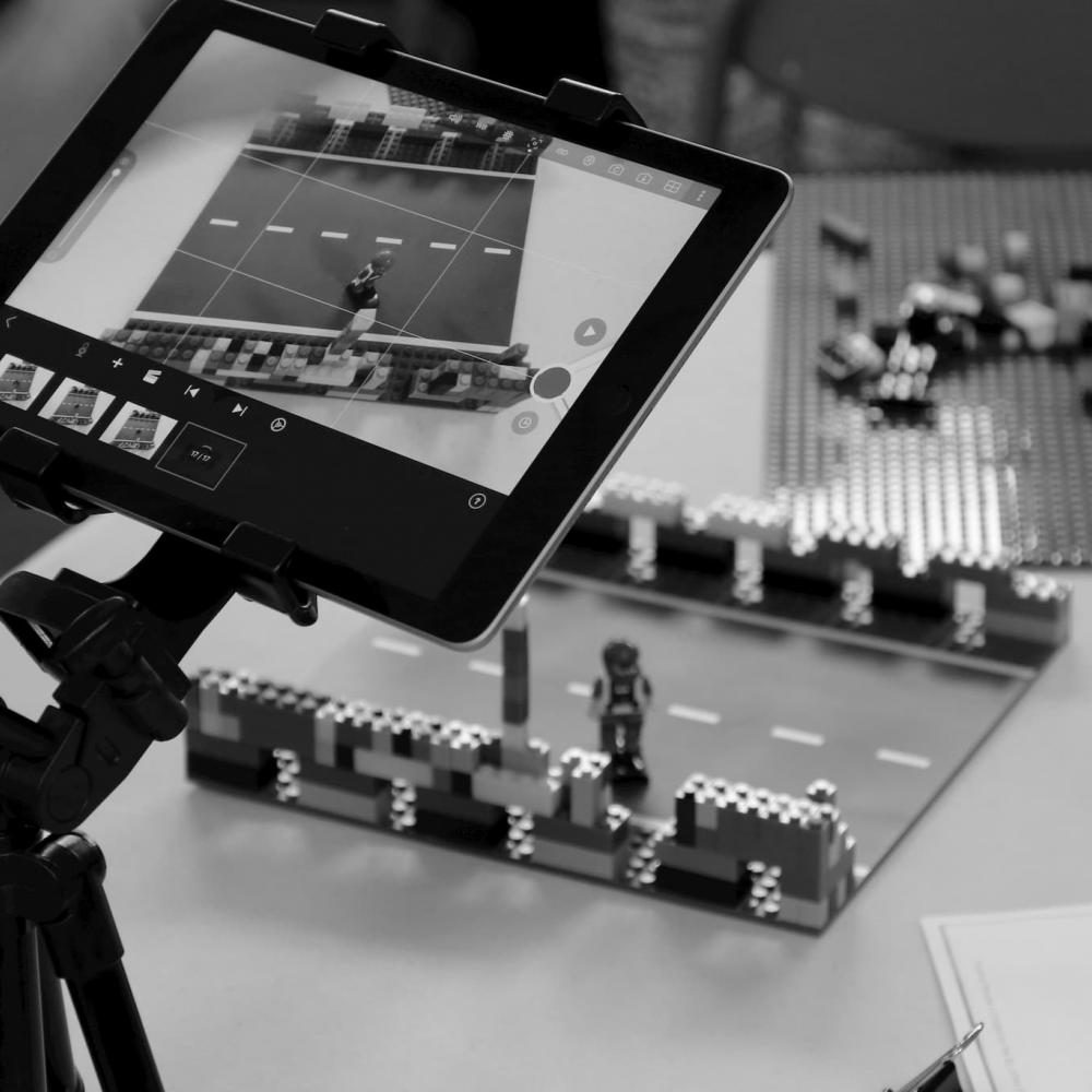 Lego scene being recorded via a tablet on a tripod