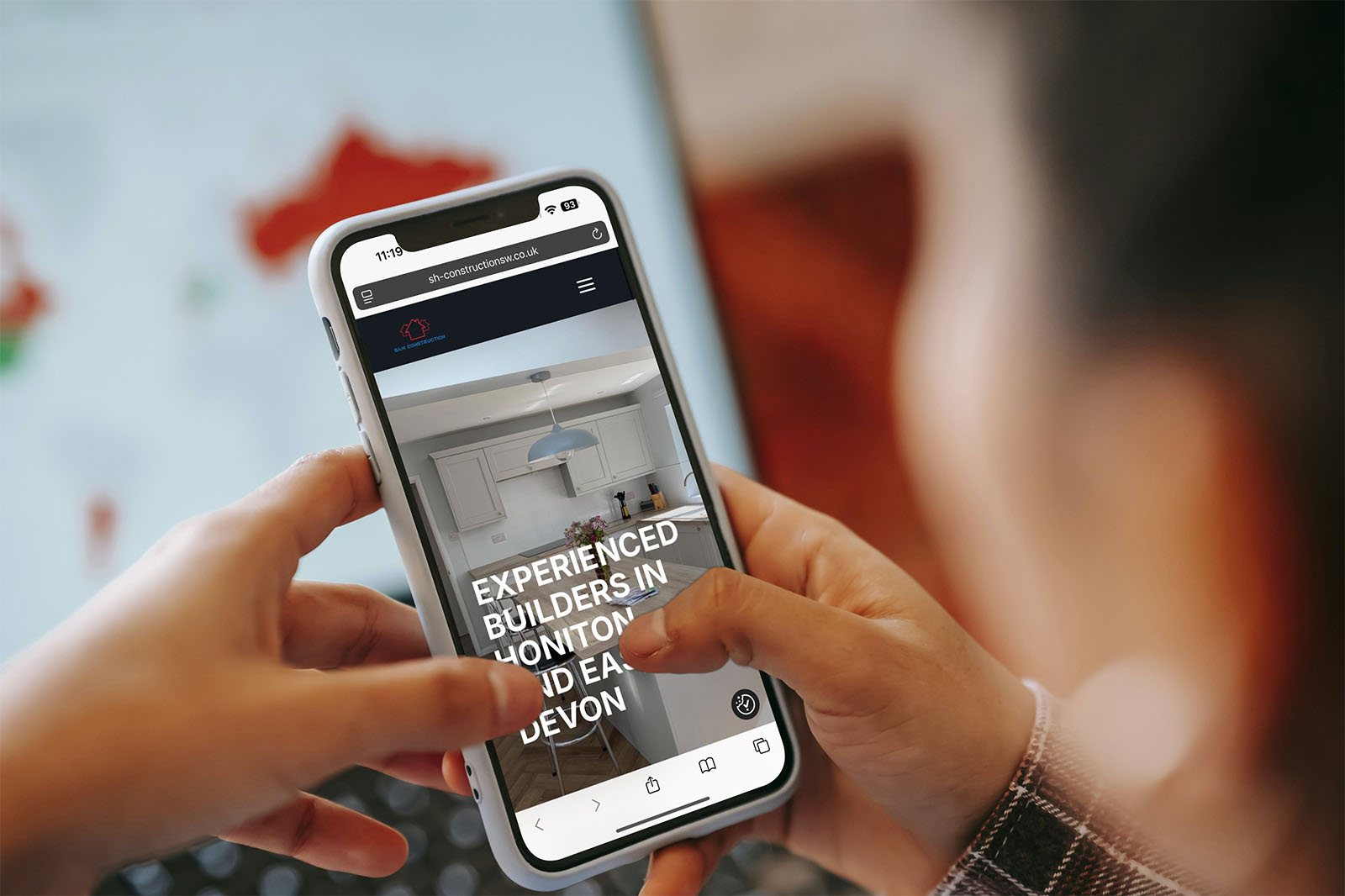 The S&H Construction website on an iPhone