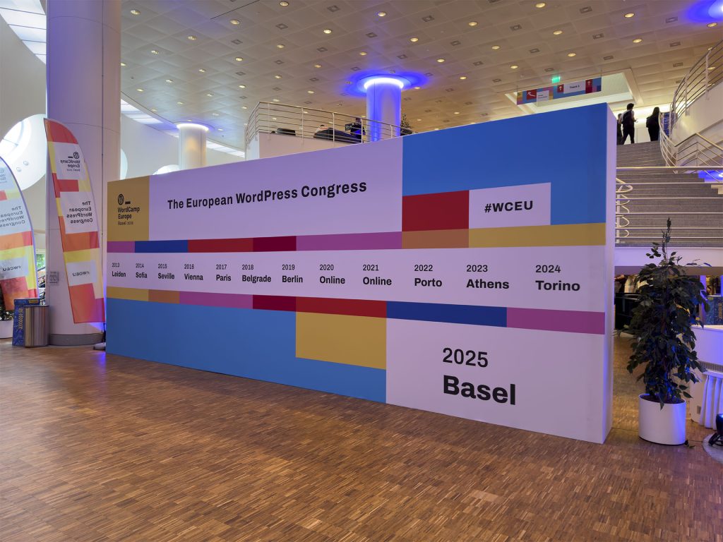 WordCamp Europe billboard showing the previous locations of the annual conference