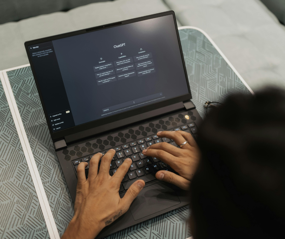 man on laptop on Chatgpt, showing AI fluency