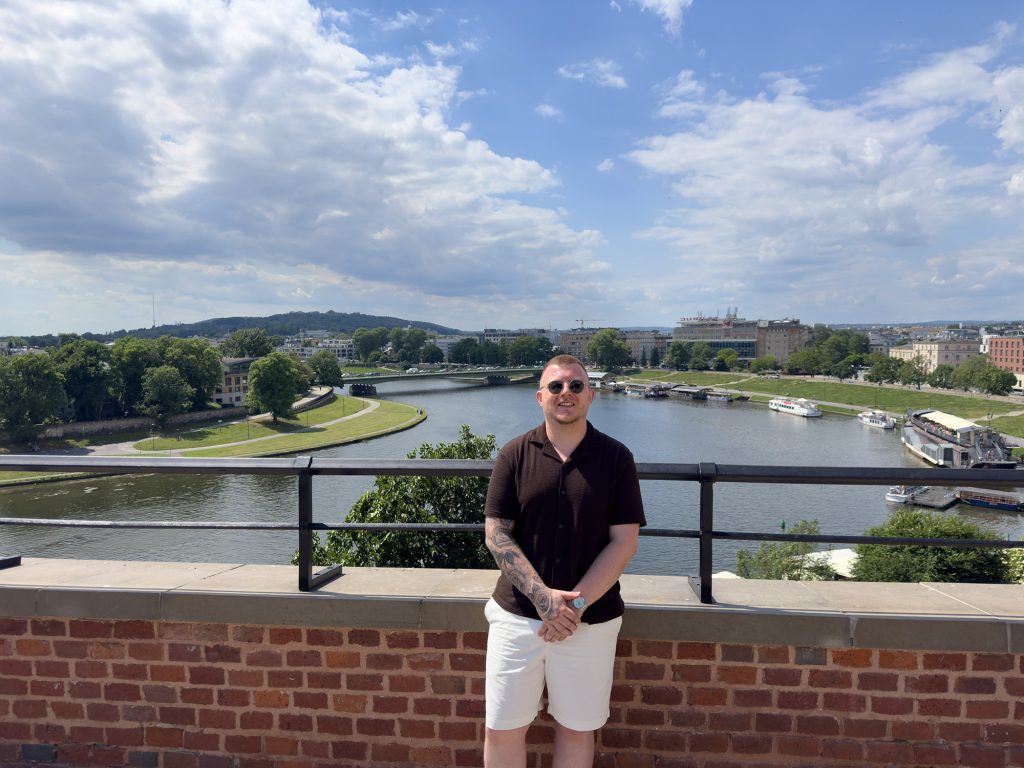 Photo of Jamie Dąbrowiecki at Wawel Castle in Krakow overlooking the river