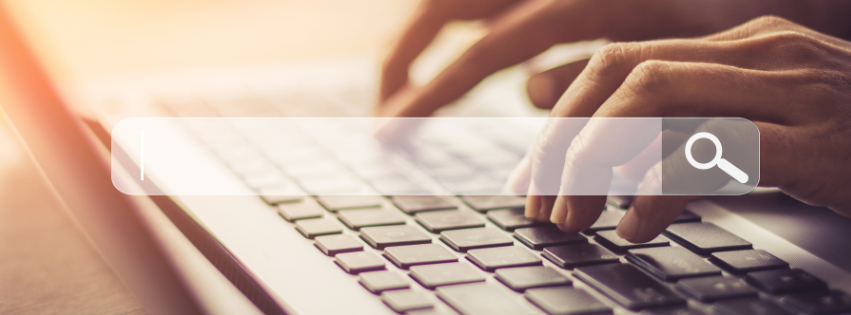 hands on a laptop keyboard